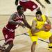 Michigan sophomore Trey Burke is defended by Indiana junior Victor Oladipo on Sunday, March 10. Daniel Brenner I AnnArbor.com
